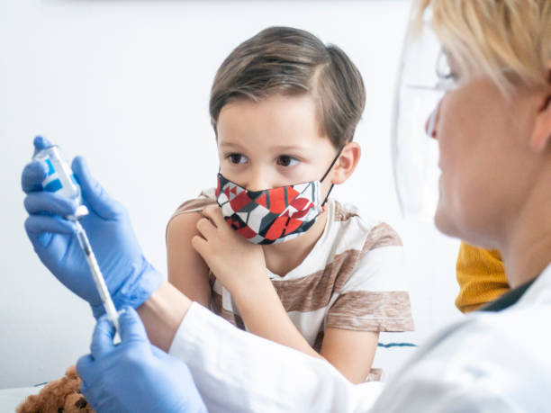 istock Little Boy Getting Vaccinated at the Pediatrician's Office 1311824810