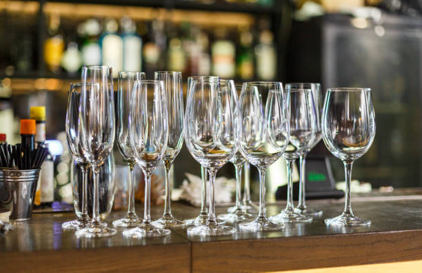 istock Empty white wine glasses on the table in the restaurant or bar. Table setting, close up. Glasses for alcohol. 1311827306