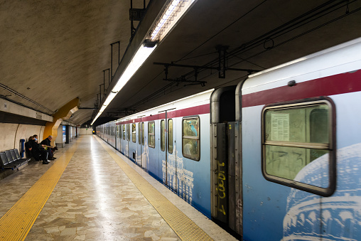 Rome, Italy. Spring 2020. Rome Metro, Colosseum station. The train starts moving from the metro platform.