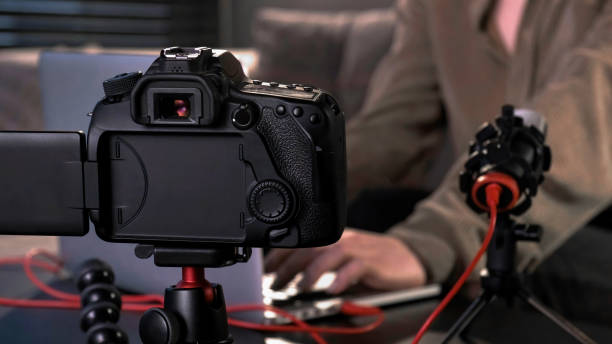 istock Young content creator girl is filming herself 1311829372