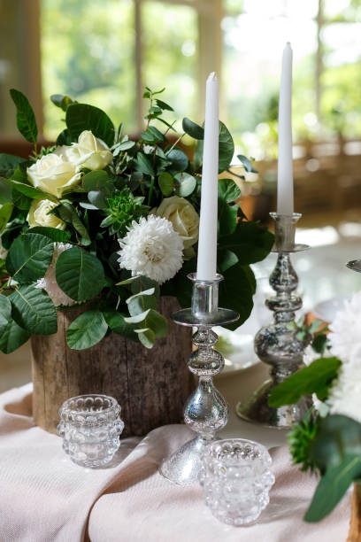 istock Newlyweds table setting decorated in rustic style. Nature theme in decoration 1311832563