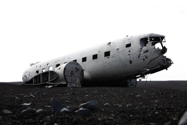 istock silhouette of a broken plane on the black beach 1311832998