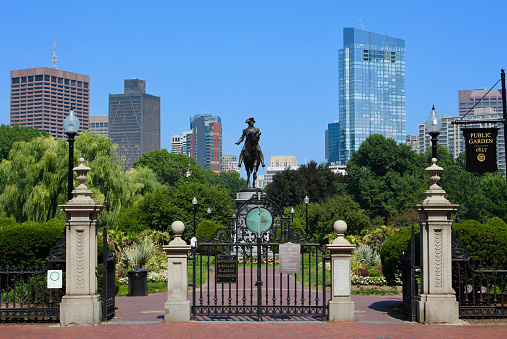 Boston Public Garden with skyline and Hancock Tower in the background