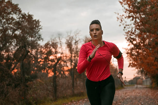 istock Young Woman running 1311838910