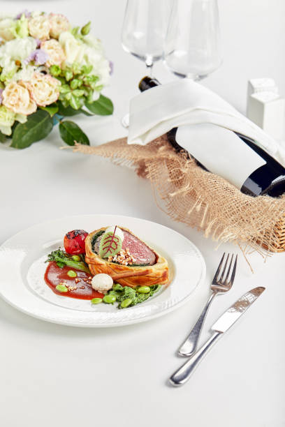 istock Easter meat roll, meatloaf for Easter dinner. Beautifully decorated catering banquet table with different food snacks and appetizers 1311840818