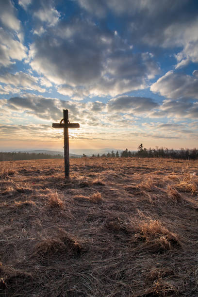 istock cross on the hill in the sunrise 1311845977
