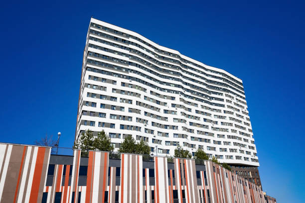 istock New modern residential apartment building on blue sky 1311850118