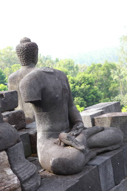 istock Buddha statue and stupas at Borobudur Temple, Central Java Indonesia 1311855177