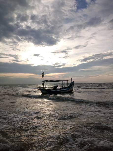 istock Fishing Boat at Dusk 1311856986