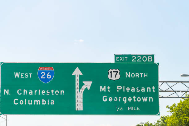 istock Direction road traffic exit 220B sign for interstate highway 26 West to North Charleston, Columbia and Mount Pleasant Georgetown on 17 street in South Carolina city 1311857083
