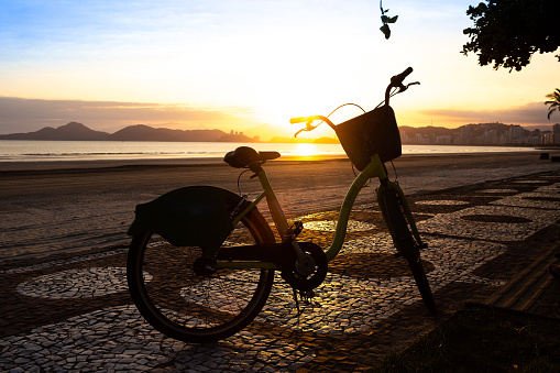Silhouette of bicycle photographed during the sunset in Santos, Brazil.