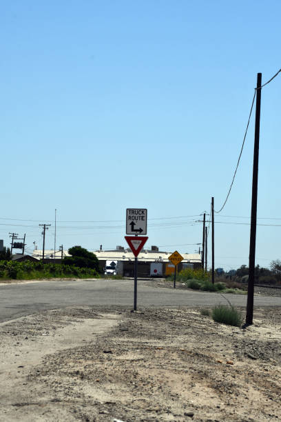 istock Truck route with a yield sign below 1311889276