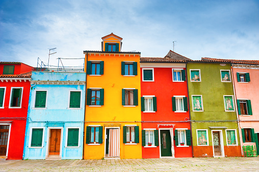 Colorful architecture in Burano island, Venice, Italy. Famous travel destination.