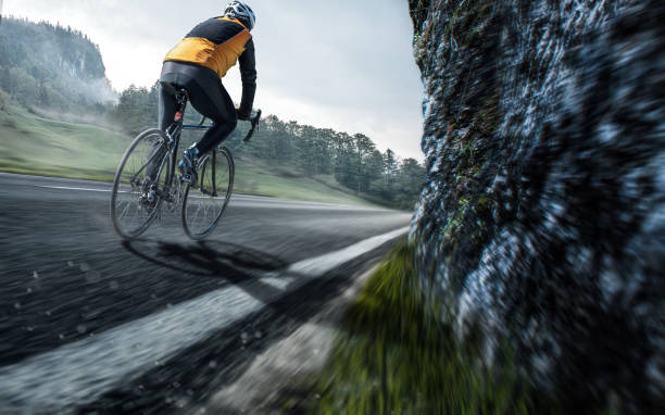 istock Cyclists on a country road 1311896185
