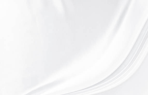 istock White gray satin texture that is white silver fabric silk background with beautiful soft blur pattern natural. 1311900858