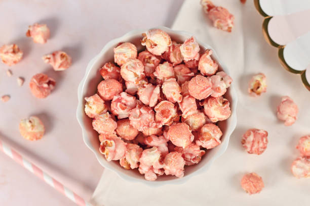 Bowl of pink colored strawberry flavored popcorn