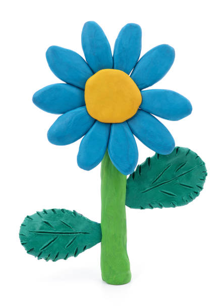 istock Plasticine blue flower with leaves. 1311909518