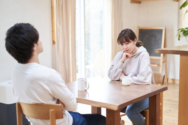 istock Asian men and women fighting 1311909544