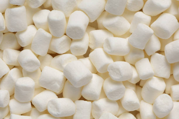 istock Heap of white air marshmallows texture or background 1311909610