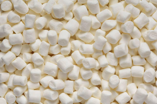 istock Heap of white air marshmallows texture or background 1311909625