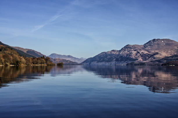 istock Mountains reflected in the lake 1311910817