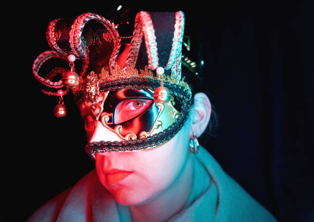istock young woman with a mask. 1311912528