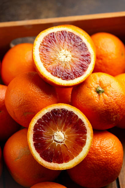 istock Fresh Red Blood Oranges in wooden box 1311913265