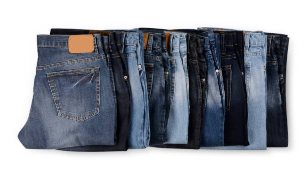 istock Stack Of Jeans In Raw With Multiple Colors Isolated On White Background 1311915424
