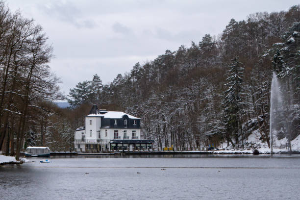 Belgium, Spa, View of Lake Warfaaz Belgium, Spa, View of Lake Warfaaz under the snow with its pedal boats. Lake Warfaaz is located at the gates of the town of Spa; in the Ardennes, in the east of the province of Liège. spa belgium stock pictures, royalty-free photos & images