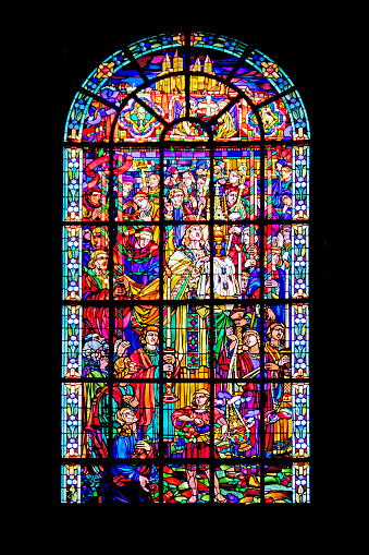 Stained glass shot of the cathedral Notre-Dame de Verdun built in the tenth century of Romanesque style, then between the XIV and XVIth century reworked in Gothic style, then finished in the eighteenth century of baroque style, at 18/135, 400 iso, f 5, 1/160 second