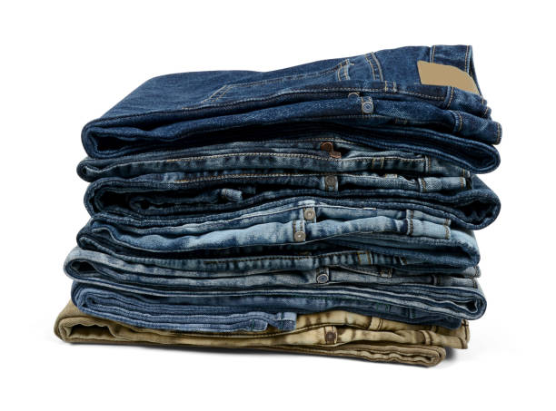 istock Stack Of Jeans With Multiple Colors Isolated On White Background 1311915809