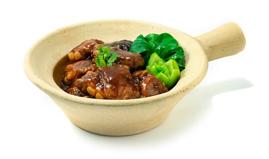 Clay Pot Braised Pork Ribs Chinese Food Hongkong Style  decorate bok choy sideview