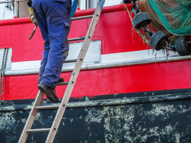Ladder on the hull in the dry dock stock photo