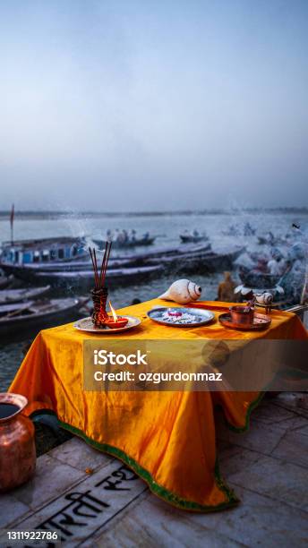 Ceremonial Objects For Ganga Aarti Ceremony Rituals At Sunrise Near Ganges River Varanasi India Stock Photo - Download Image Now