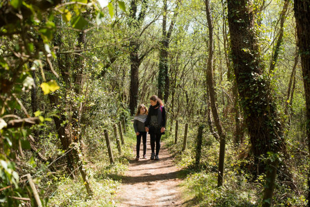 istock walk with mom in the forest 1311922891