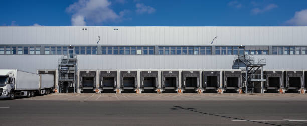 istock truck at loading docks of a warehouse 1311925439