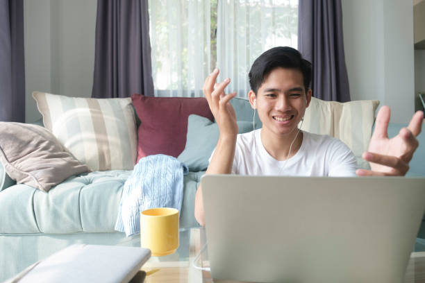 istock Young man video call conference online with his colleagues. 1311928609