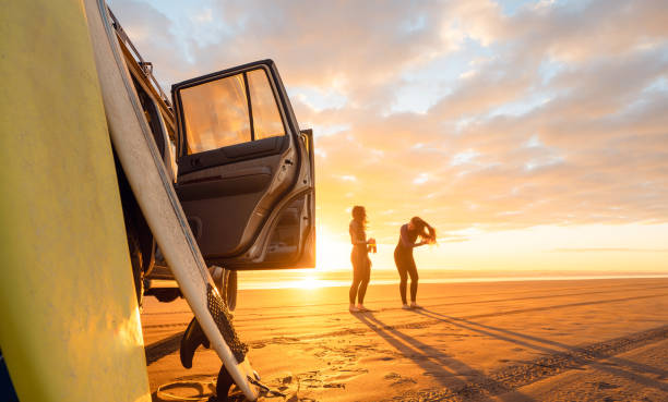 istock Enjoying sunset after long day surfing. 1311930461