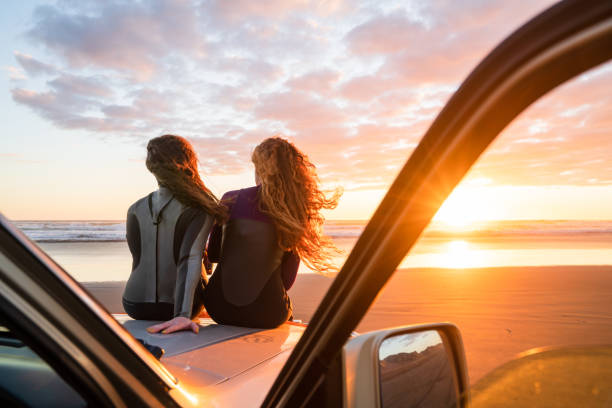 istock Friends enjoying beauty after surfing. 1311930541