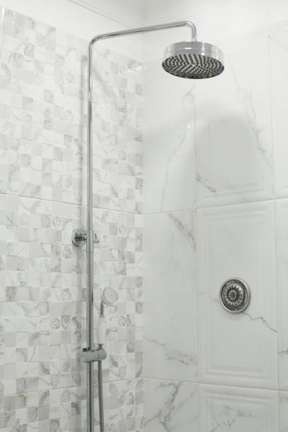 istock Shower and ceramic tiles in bathroom 1311932937