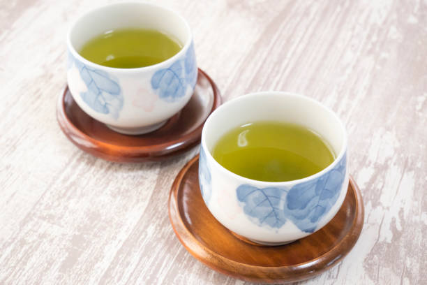istock Green tea in a teacup 1311934015