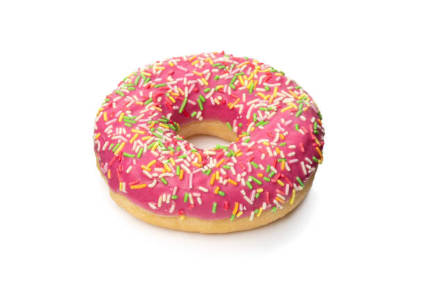 istock Donut with sprinkles isolated on white background top view 1311934753