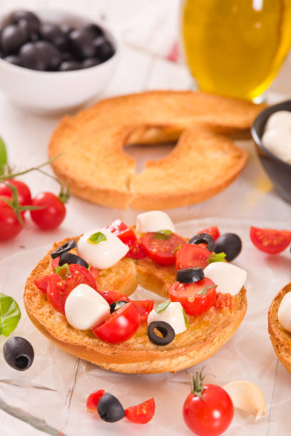 istock Friselle with tomatoes and mozzarella cheese. 1311935245