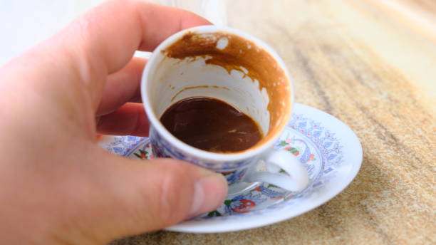 istock Traditional turkish coffee pot with iznik tile shape around it. 1311936498