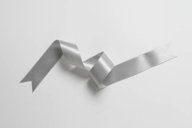 istock A roll silver color ribbon isolated on white background 1311938149