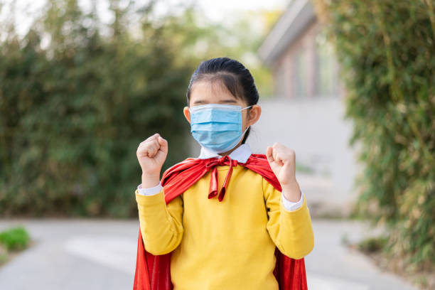 istock Mask Supergirl Make Forbidden Gesture 1311944991