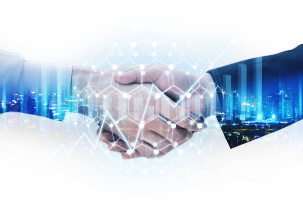 istock Business man handshake with network connection city graphic 1311947687