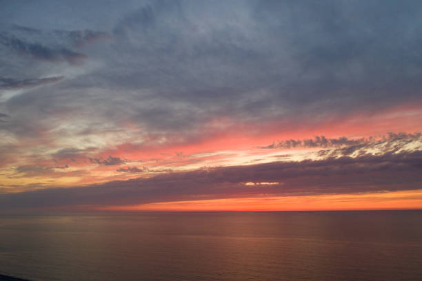 istock Beautiful orange sunset view from drone 1311950854