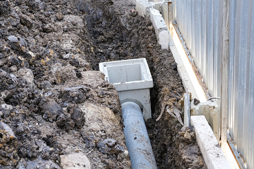 cement tube and square block underground soil for water drain water.