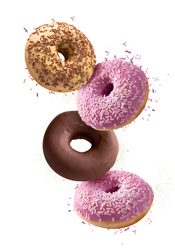 Various doughnuts isolated on colourful background